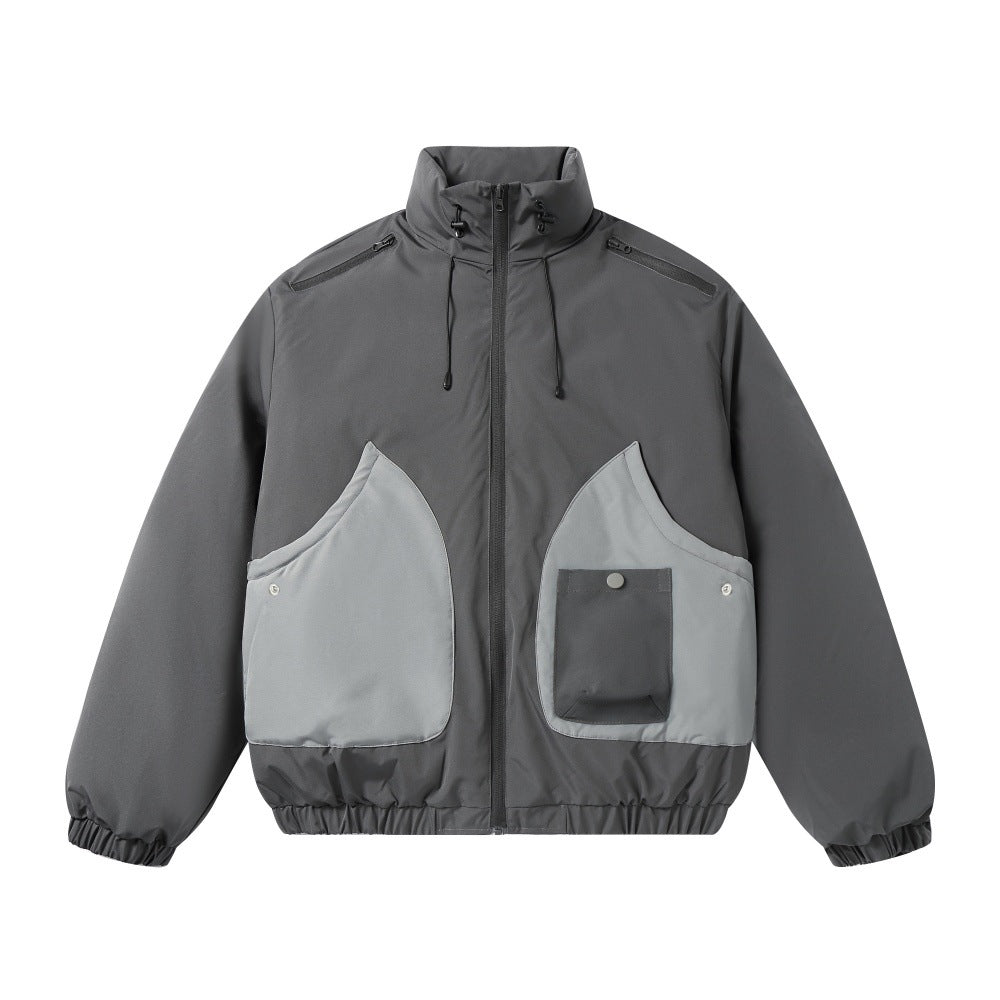 jaqueta bomber cinzenta com bolsos em patchwork.